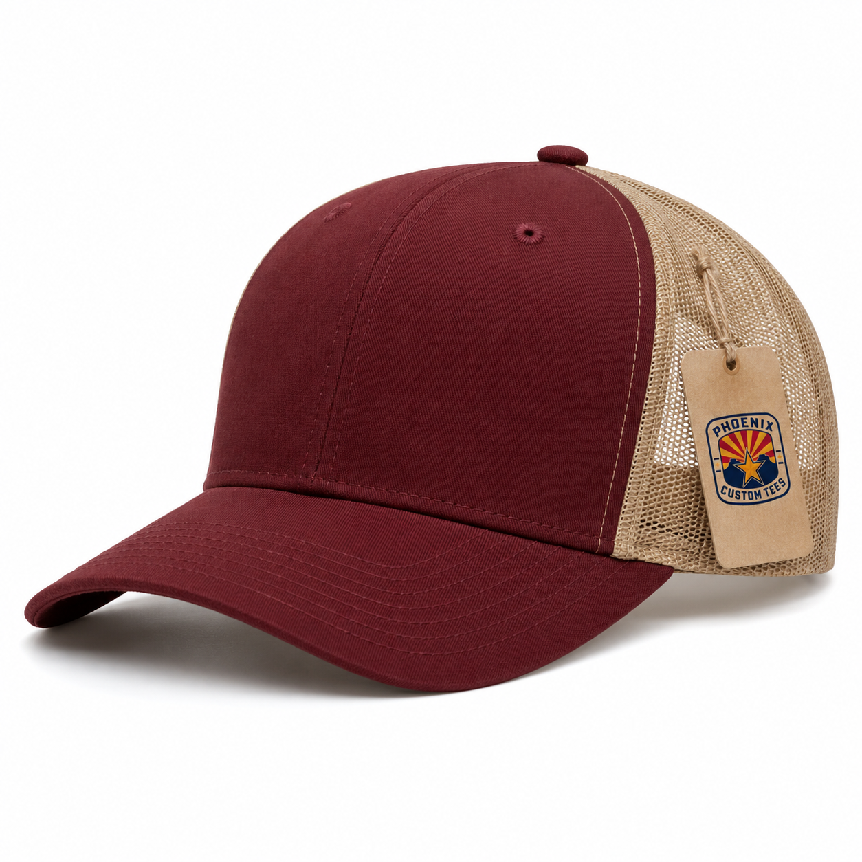 Burgundy and Tan Trucker Cap Phoenix Custom Tees Burgundy and tan mesh trucker cap on a white background with a Phoenix Custom Tees product tag<br />