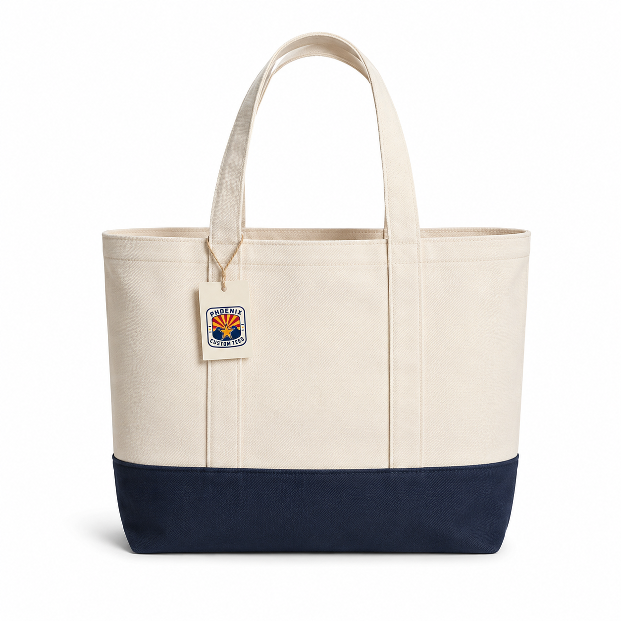 Cream and Navy Custom Tote Bag Phoenix Custom Tees Cream and navy canvas tote bag on a white background with a Phoenix Custom Tees product tag<br />